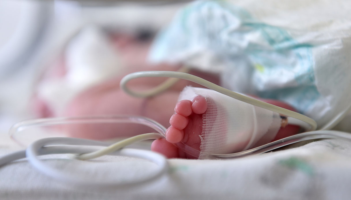 Bambino lasciato nel cassonetto