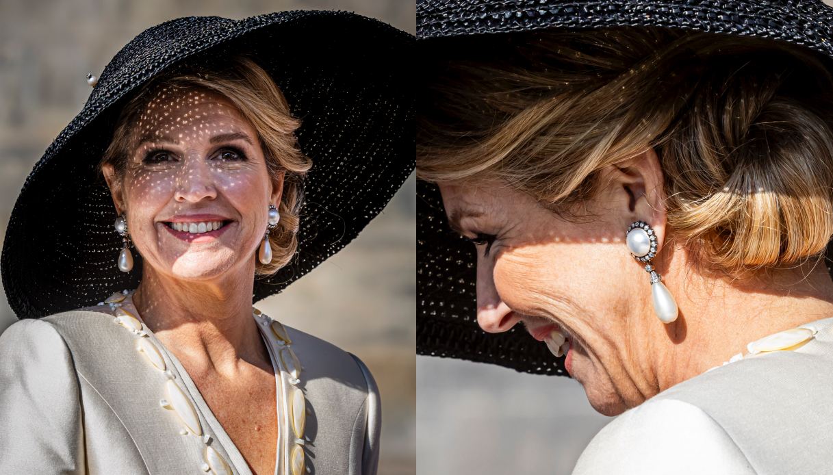 Maxima d'Olanda, cappello e pendendi non mancano mai